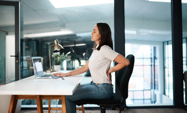 Side view of ergonomic chair and desk height alignment